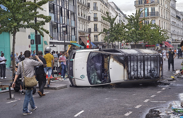 An RATP van turned over and burned in a demonstration in Paris.