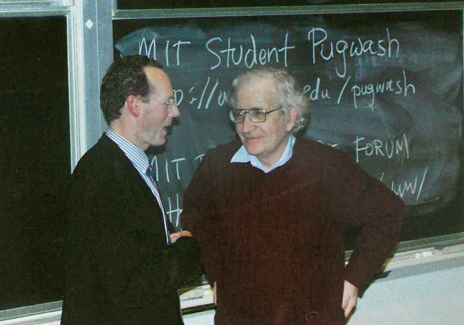 Paul Farmer with Noam Chomsky at a conference in MIT.