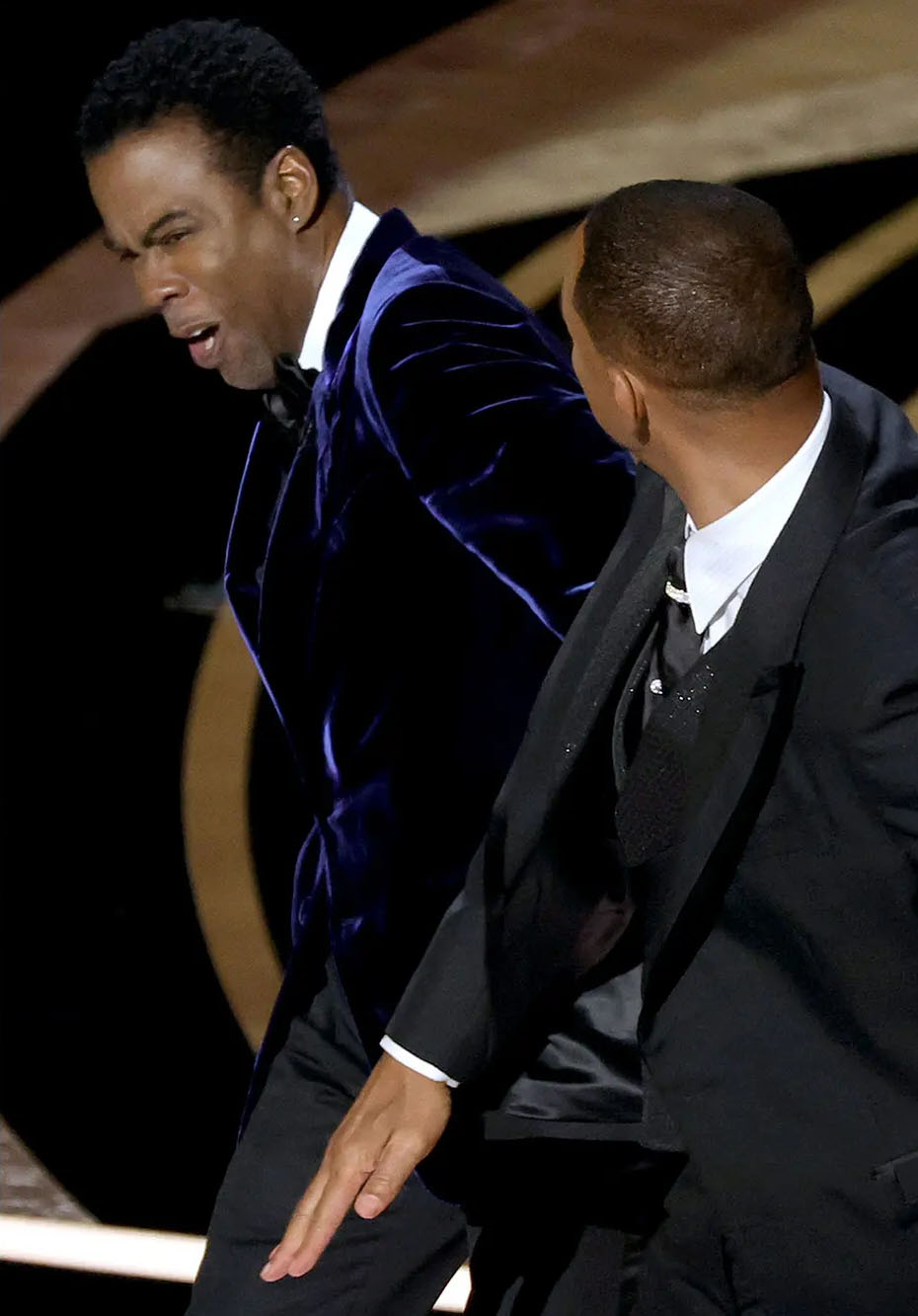 Will Smith slapping Chris Rock at the Academy Awards on March 27, 2022.