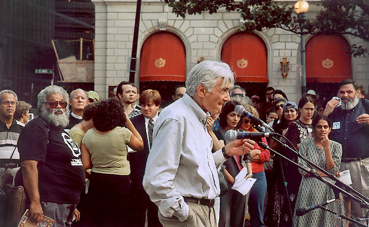 Howard Zinn with a group that comprises the poet Gary Hicks (beard, left) and a Boston rabbi (beard, right) in the first peace rally in Boston after the September 11 attacks.