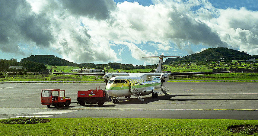 A turbo-prop plane refueling at the Tenerife airport in the Canary islands.