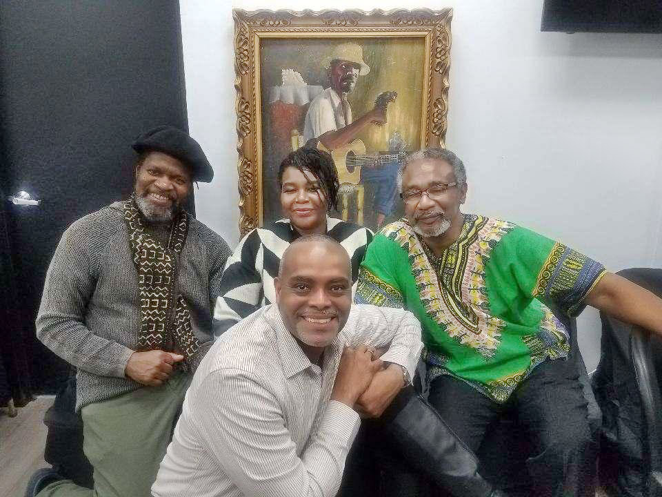 Jean-Robert Boisrond, Carline Désiré, Patrick Sylvain and Tontongi at a commemoration ceremony for Manno Charlemagne.