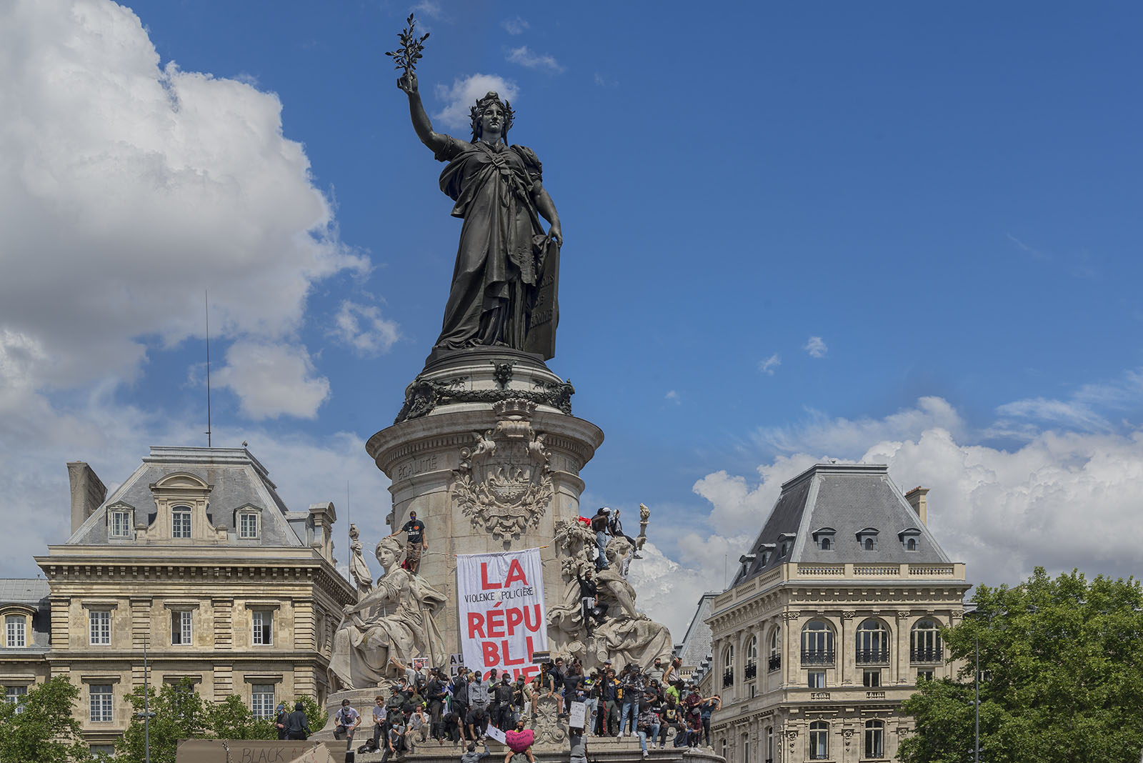 Demonstrators on the statue of Marianne, the national mascot of France in place de la République on Saturday June 13th 2020, commemorating George Floyd’s execution and the murder of Adam Traoré.