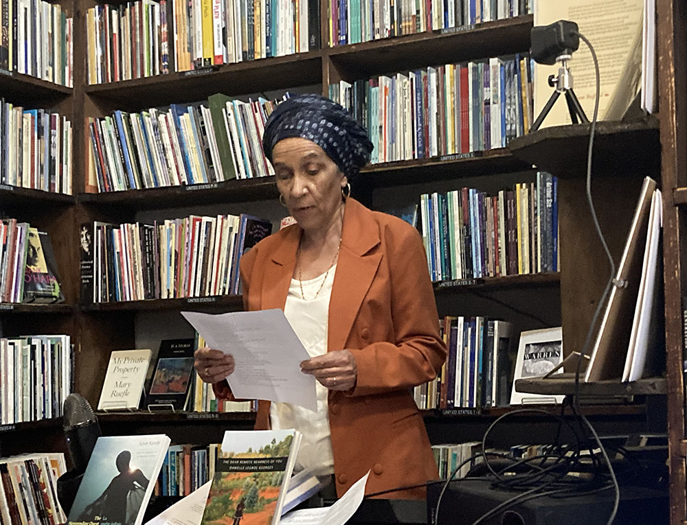 Poet Sylvie Kandé reading at Grolier Book Shop in Cambridge, Massachusetts, on July 19th 2022