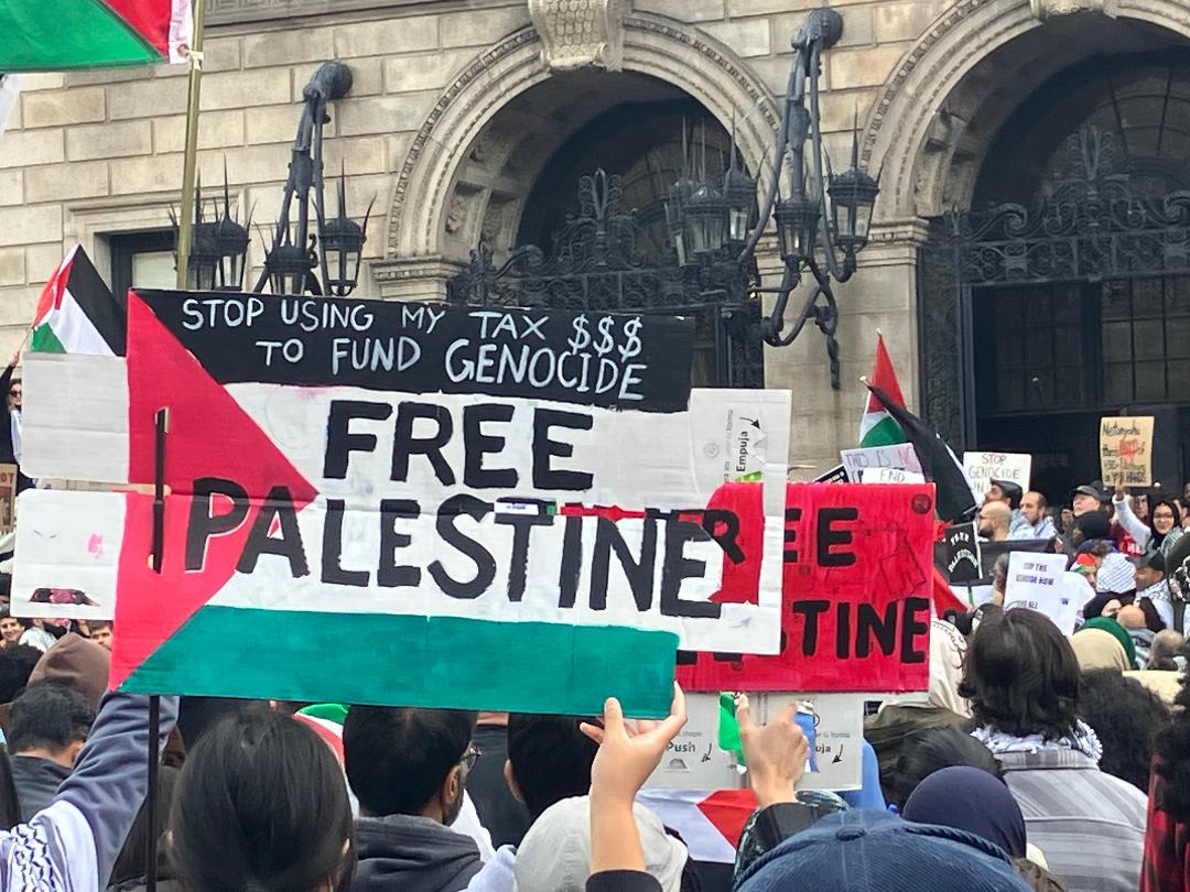 Protesting in front of the Boston Public Library for a free Palestine
